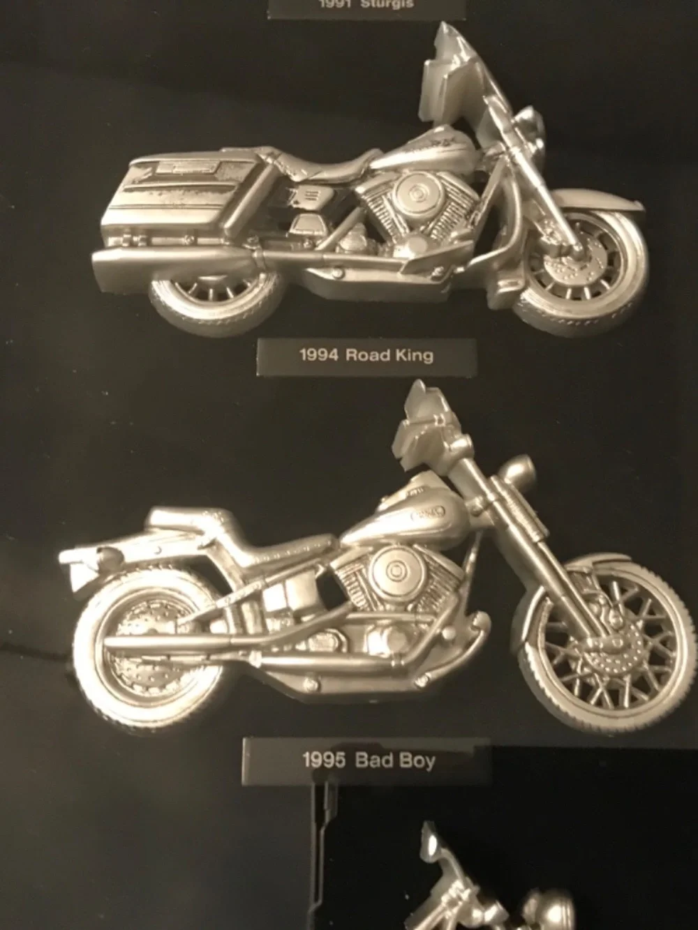 Framed Harley Davidson memorabilia